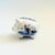 A vintage Delft ceramic piggy bank. Lovely hand painted designs and a rubber stopper in the base. Made in Holland....