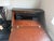 Vintage slant-front secretary desk in the Colonial Revival / Early American style, likely dating to the 1930s–1940s....