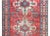 A remarkable early 20th century Persian Kazak rug with the most wonderful pattern containing two large white diamond...