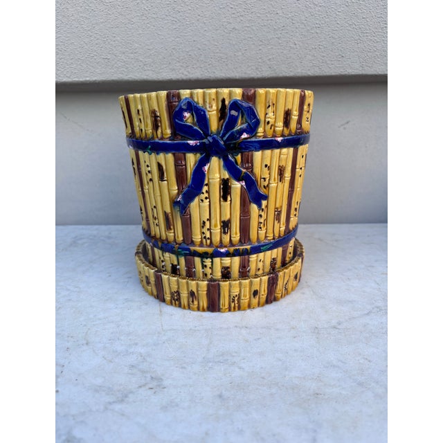 19th Century Victorian Majolica Bamboo Cachepot Minton. Decorated with a blue ribbon. Height / 7.4 inches . Diameter / 6.6...