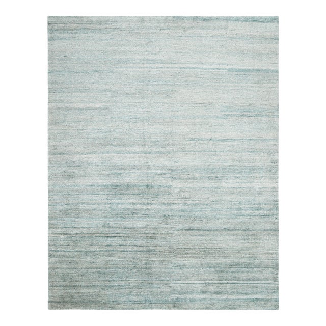 Hand-knotted in a luxurious blend of all-natural silk, this 9x11 textural rug is an exciting new addition to the Texture...