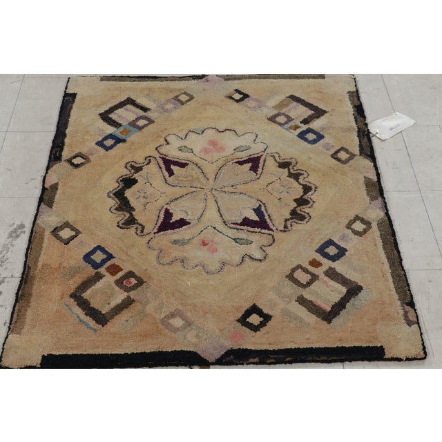 Handmade in wool and originating circa 1920-1930, this 3x4 rug is a rare and exciting new curation in Rug & Kilim’s...