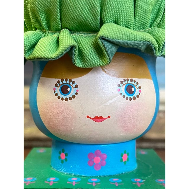Green Vintage Hand-Painted Folk Art Doll Figurine on Wooden Block Base With Fabric Bonnet, Signed Mary Maki Rae For Sale - Image 8 of 10
