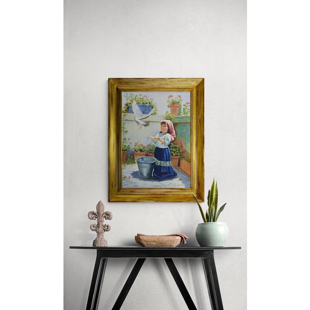 Elegant vintage oil on canvas by s. Alfano, signed on the reverse, depicting a young girl releasing a white dove on a...