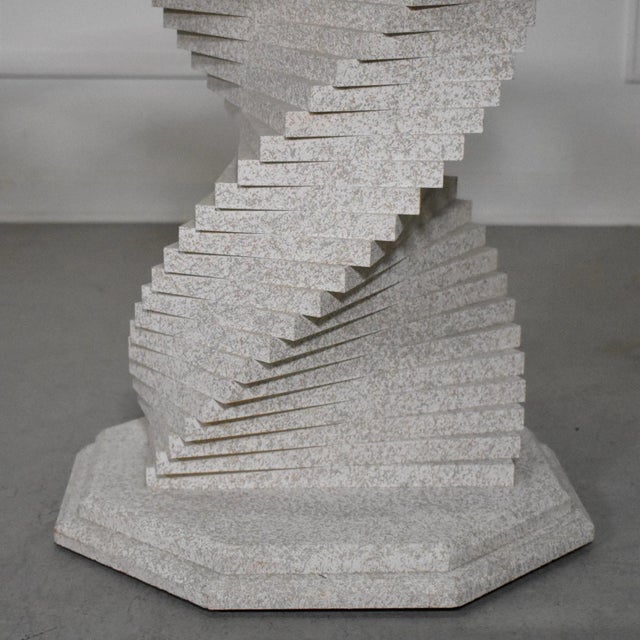 Unusual textured faux stone stacked helix spiral entry or dining table with beveled hex glass top. Can be used with or...