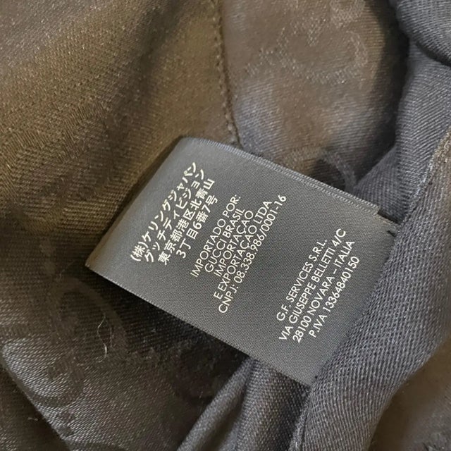 A Never Used Black Wool Scarf by Gucci With Continuous Logo For Sale - Image 6 of 12