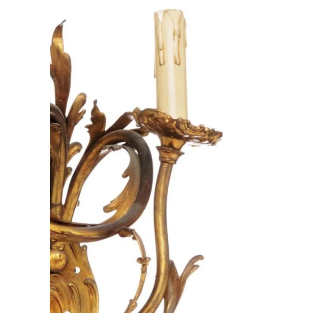 Two light wall appliance. French, 19th century. Louis XV style in bronze relief and chiseled decoration. Height: 40 cm....