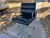 The Authentic Herman Miller Eames Soft Pad Management Office Chair in black leather is a high-quality desk chair designed...