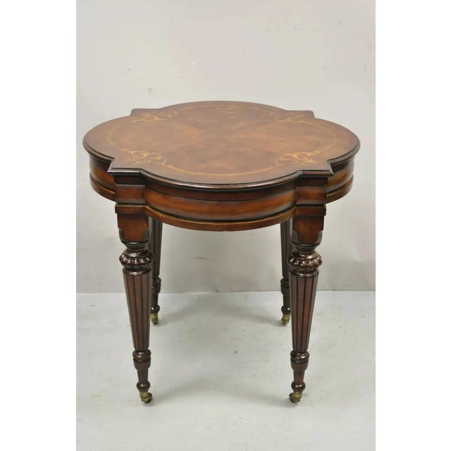Ethan Allen Italian Mediterranean Style Marquetry Inlay Accent Side Center Table. Item features rolling casters, solid...