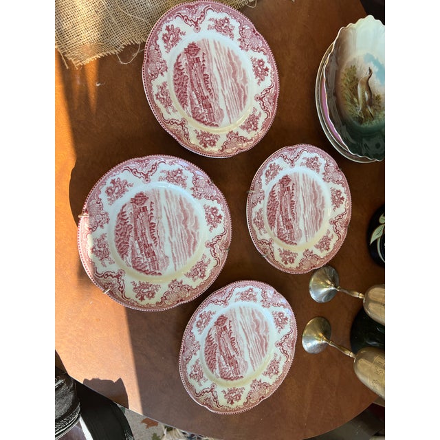 Up for consideration is a beautiful collection of Chattsworth 1792 pink and white ceramic plates with brass hanging...