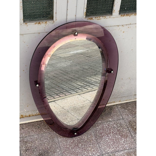 Wall mirror with purple acrylic glass frame in the style of Cristal Arte, Made in Italy, 1960s. Good condition; minor...