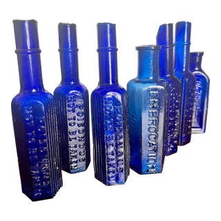 Curated Collection of 6 Victorian Cobalt Blue Apothecary & Poison Bottles For Sale