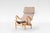 A timeless expression of Swedish modern design, this vintage Bruno Mathsson lounge chair for DUX pairs a sculptural bent...