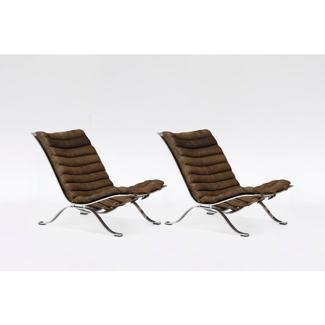 The Ari Chair by Arne Norell is a stunning example of Scandinavian Modern design, combining luxury with effortless...