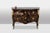 Lacquer saute chest of drawers opening with two drawers on the front with its scalloped marble top in black color. Work...