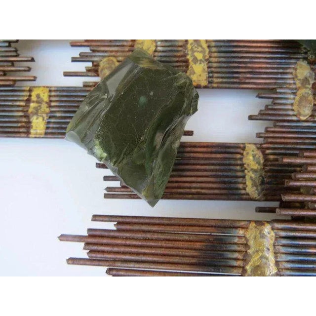 Great non directional metal and green resin sculpture. Mounting hooks on back.