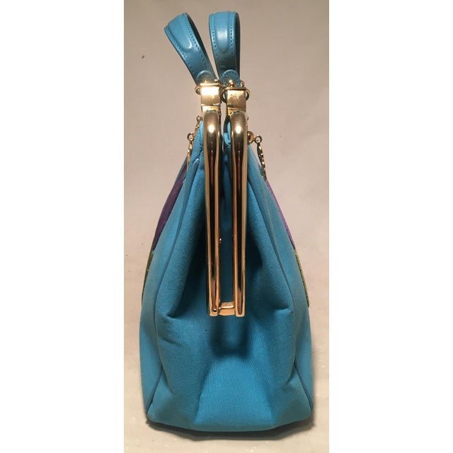 Roberta Di Camerino blue linen and velour handbag in excellent condition. Blue linen exterior with green, blue, and purple...
