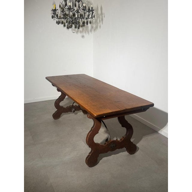 Authentic 18th century Spanish dining table crafted in solid oak, featuring a beautiful aged patina and traditional...