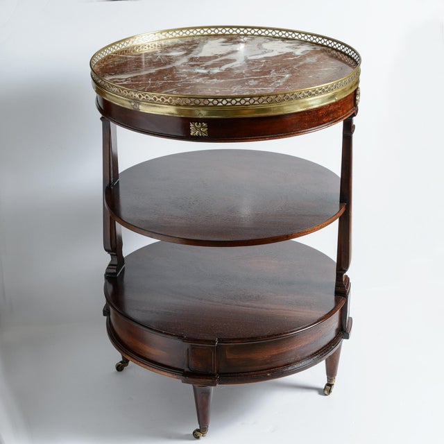 This early 20th century French Louis XVI Style Three Tier table is called a Bouillotte table or dessert table or tea...
