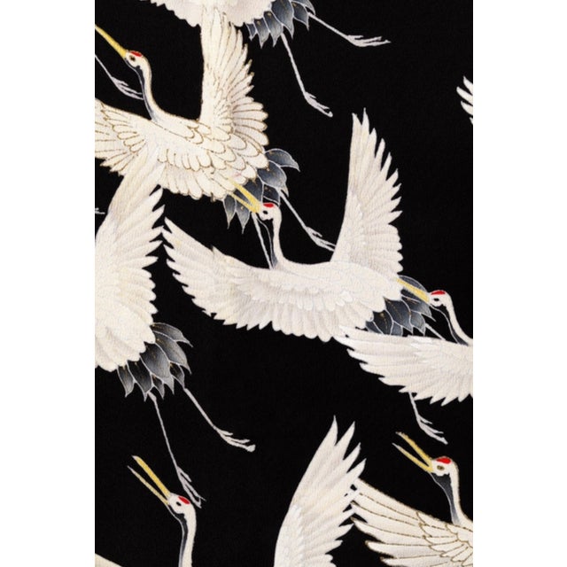 Vintage Japanese crane wall art giclée print reproduction featuring a dramatic flying cranes textile pattern from an early...