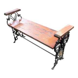 Antique Cast Iron and Wooden Bench With Arm Rests For Sale