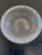 This exquisite crystal bowl, with its deep diamond-cut pattern and striking radiating center, is a masterpiece of light...