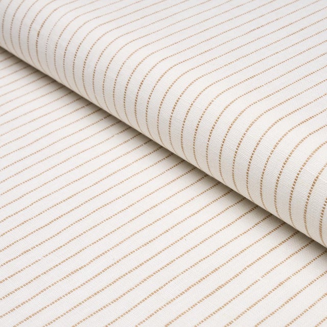 Featuring slightly irregular narrow stripes, Theo Stripe is a soft, lightweight woven made of 100% linen. Subtle texture...
