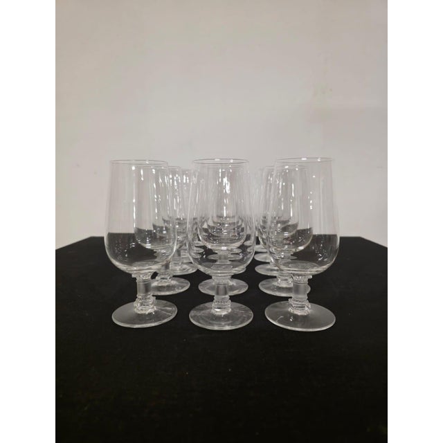 15 Murat Glasses by Lalique France Refined glasses with a bowl made of the finest crystal. Column-shaped stem in frosted...