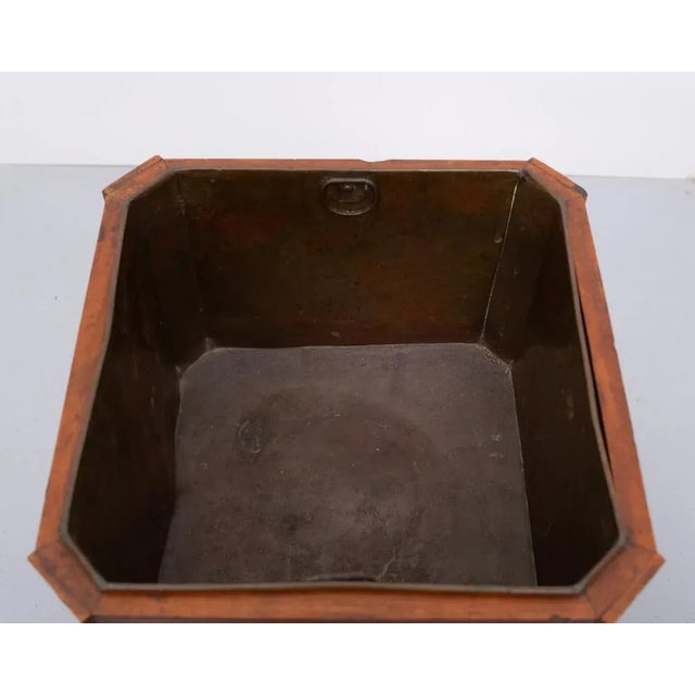 Circa 1850, neat-sized Dutch inlaid mahogany jardinière. The square top with canted corners, containing its original brass...