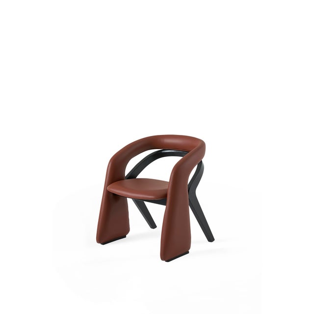 The Patara Dining Chair reimagines contemporary design through its bold, dynamic silhouette and sculptural presence....
