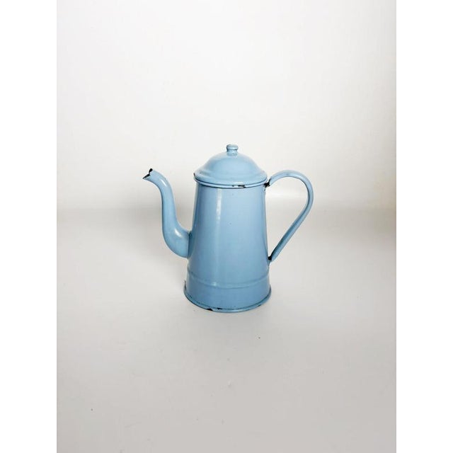 Charming French enameled iron coffee pot dating from the 1960s, finished in a soft pastel blue enamel. The piece features...