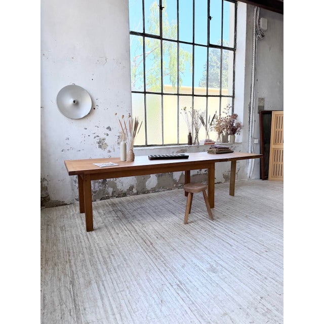 Vintage 1960s farmhouse table with extension leaf. made entirely of solid oak, we love the wood grain and its luminous...