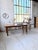 Vintage 1960s farmhouse table with extension leaf. made entirely of solid oak, we love the wood grain and its luminous...
