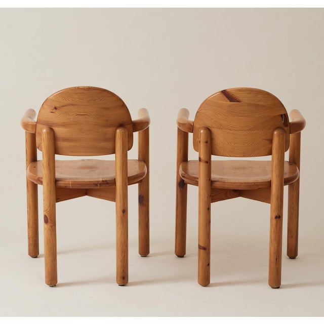 Set of 6 pine dining chairs by Danish Designer Rainer Daumiller from the 1960's-1970's. These set of chairs have 2 with...