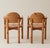 Set of 6 pine dining chairs by Danish Designer Rainer Daumiller from the 1960's-1970's. These set of chairs have 2 with...