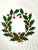 A festive set of twelve vintage SCIO dinner plates featuring the classic Holly pattern. Each creamy white plate is...