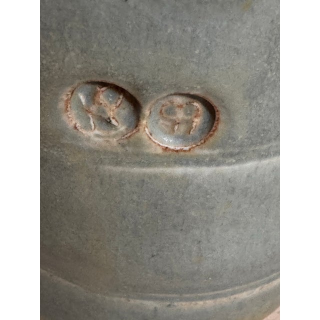 Really pretty vintage studio pottery piece in the softest blue grey glaze with warm brown accents around the lid and...