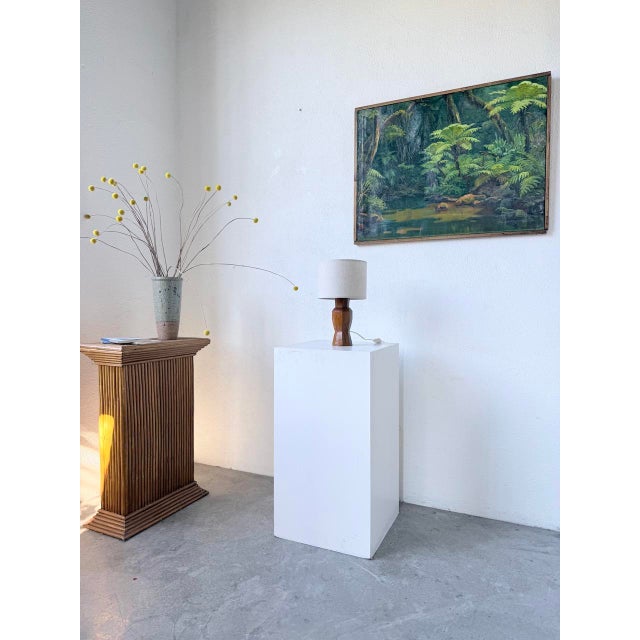 Vintage lamp with a hand-carved solid walnut base in a brutalist style, dating from the 1950s. entirely handcrafted and...