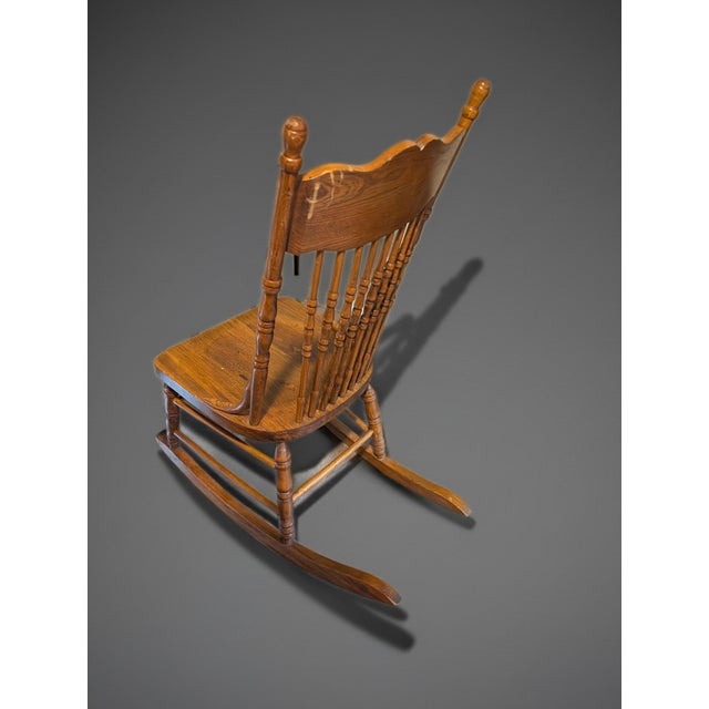 Barker Brothers & Cie Vintage Pressed Back Oak Rocking Chair – Ornate Wooden Windsor Spindle Rocker. For Sale - Image 4 of 4