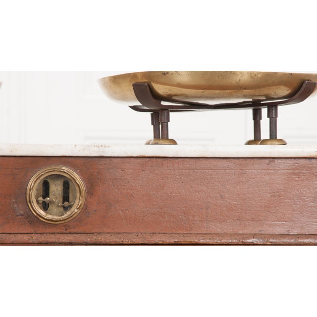 A large kitchen / culinary scale made in Lyon, France circa 1880. This wonderful antique instrument was used to measure...