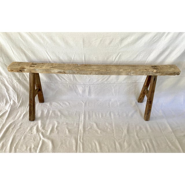 Antique handcrafted Shandong bench primitively constructed of solid elm using mortise and tenon construction. This...