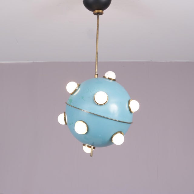 This elegant 1960s pendant lamp, model 551, was designed by oscar torlasco for lumi, italy. A beautiful example of italian...