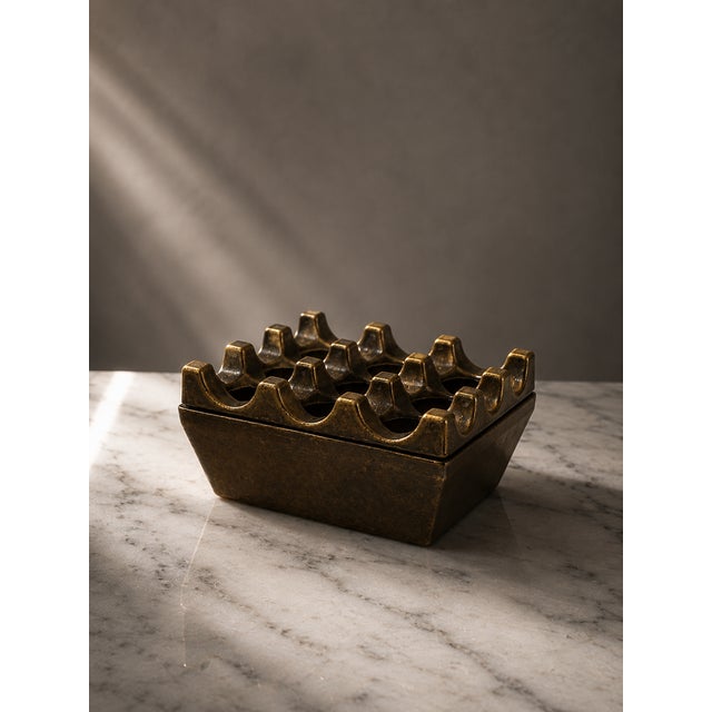 An absolute icon of mid-century Scandinavian modernist design the legendary Ultima 9 ashtray designed by the celebrated...