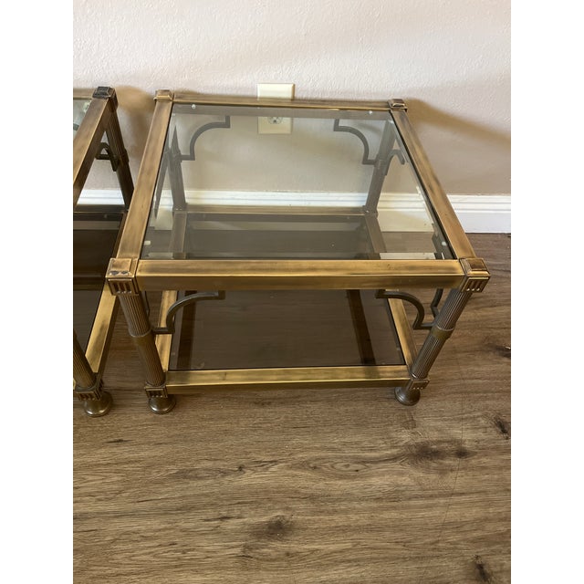 Pair of heavy side tables in mastercraft style excellent condition heavy smoked glass on bottom and clear beveled glass top