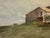 Original watercolor on paper depicting a quiet rural landscape with a farmhouse or agricultural building on a grassy...