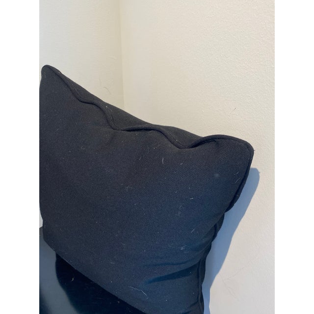 Elevate your home decor with this sophisticated black decorative pillow, a versatile piece designed to anchor any interior...