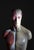 Vintage anatomical torso model with removable internal organs, showing the musculature on one half and the skin on the...
