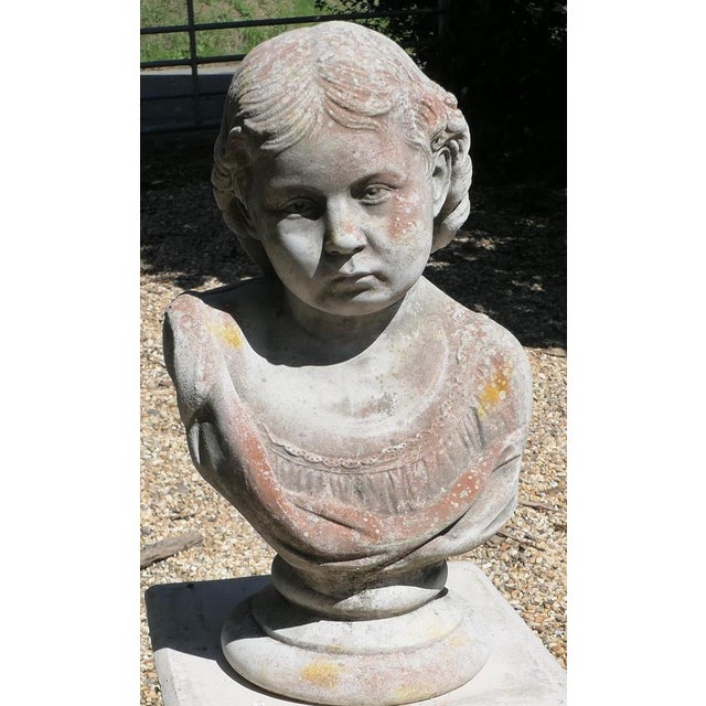 Head and Shoulder Bust of a Young Girl Garden Statue This is a charming detailed bust of a rather wistful young girl, note...