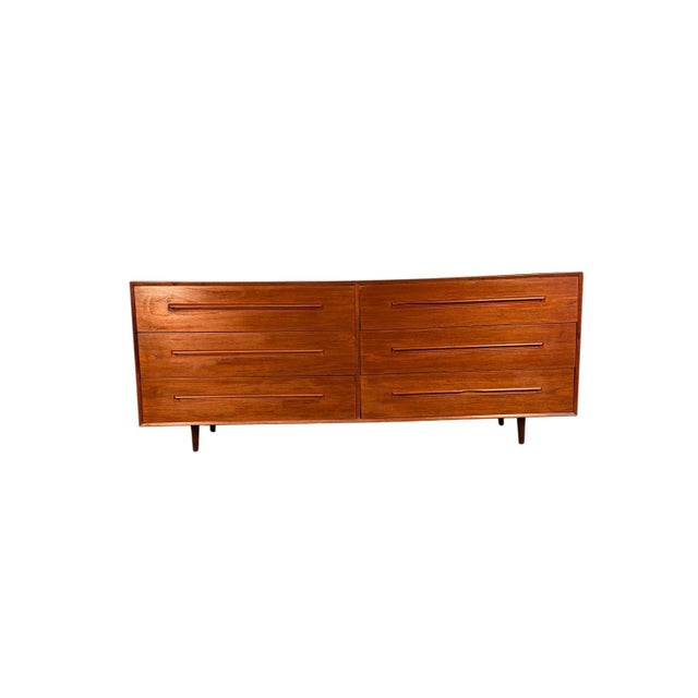 Beautiful mid century modern teak dresser by Westnofa of Sweden. Classic Scandinavian design with clean lines, recessed...