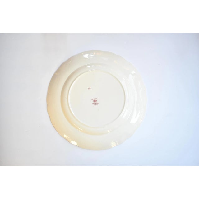 A vintage English Johnson Bros. large round plate, charger, or platter, in the "Dorchester" botanical pattern of red...